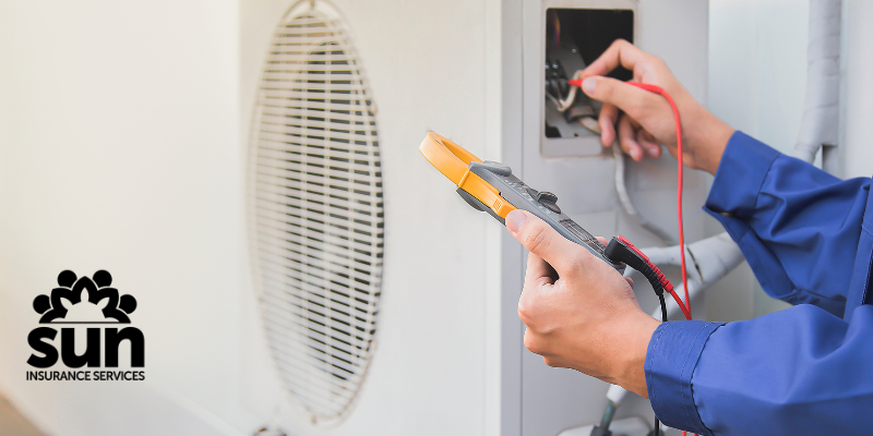 Florida HVAC contractor on rooftop reviewing workers comp insurance requirements